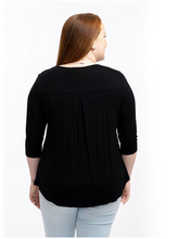 Load image into Gallery viewer, A 3/4 sleeve breastfeeding top in black that you can wear pregnant. Does not look like a maternity top
